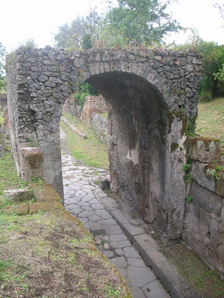 Nola Gate, Pompeii. May 2010. 
Looking west towards gate and north wall, on right. Photo courtesy of Ivo van der Graaff.
