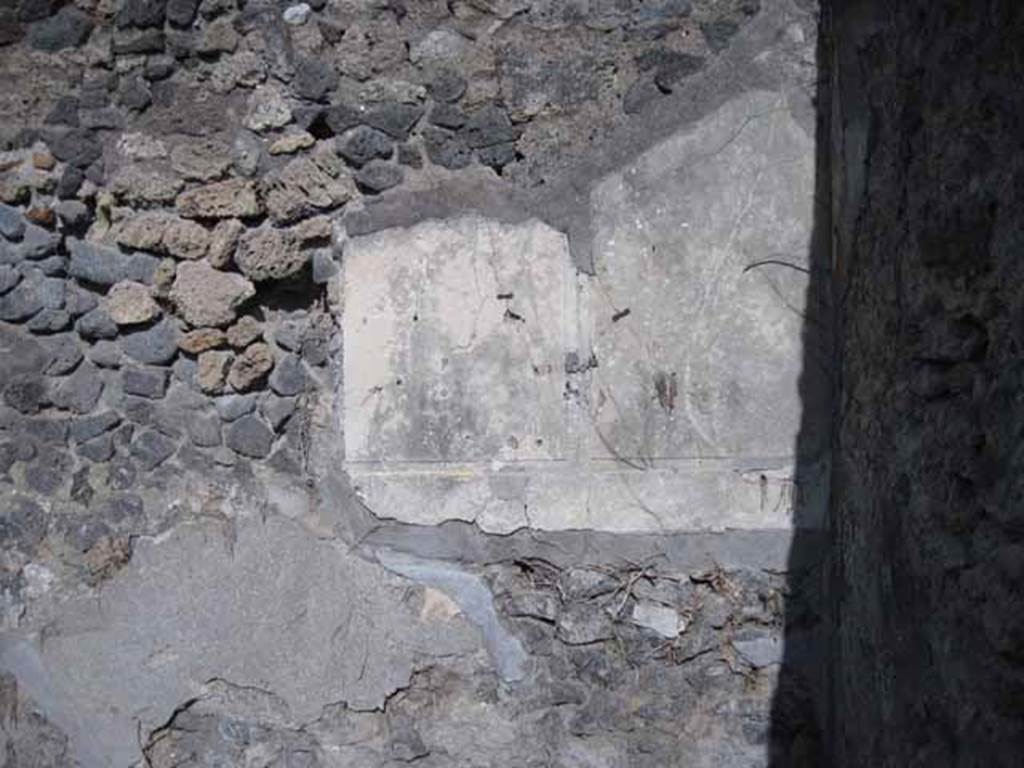 1.2.16 Pompeii. September 2010. Room 3, looking east. Detail of first style fresco remains on east wall. Photo courtesy of Drew Baker.
