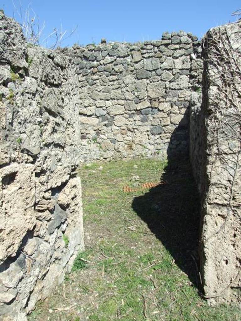 I.2.16 Pompeii.  March 2009. Doorway to Room 2. Kitchen? with Well and Stairs to upper floor.