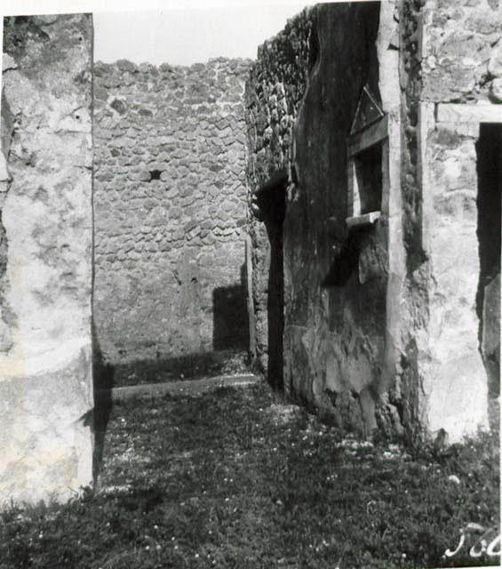 I.2.17 Pompeii.  March 2009. Room 3. Kitchen, and stairs to upper floor. East wall. 