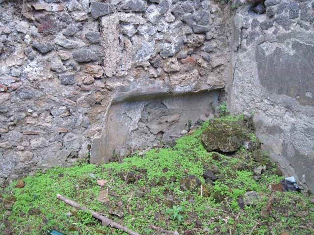 I.2.24 Pompeii. September 2010. South wall of room, in south-west corner, showing sleeping/reclining recess feature. Photo courtesy of Drew Baker.
