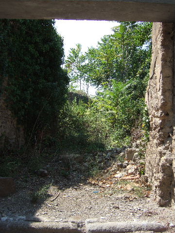 I.3.27 Pompeii.  March 2009. East wall of small room with window onto Vicolo. 