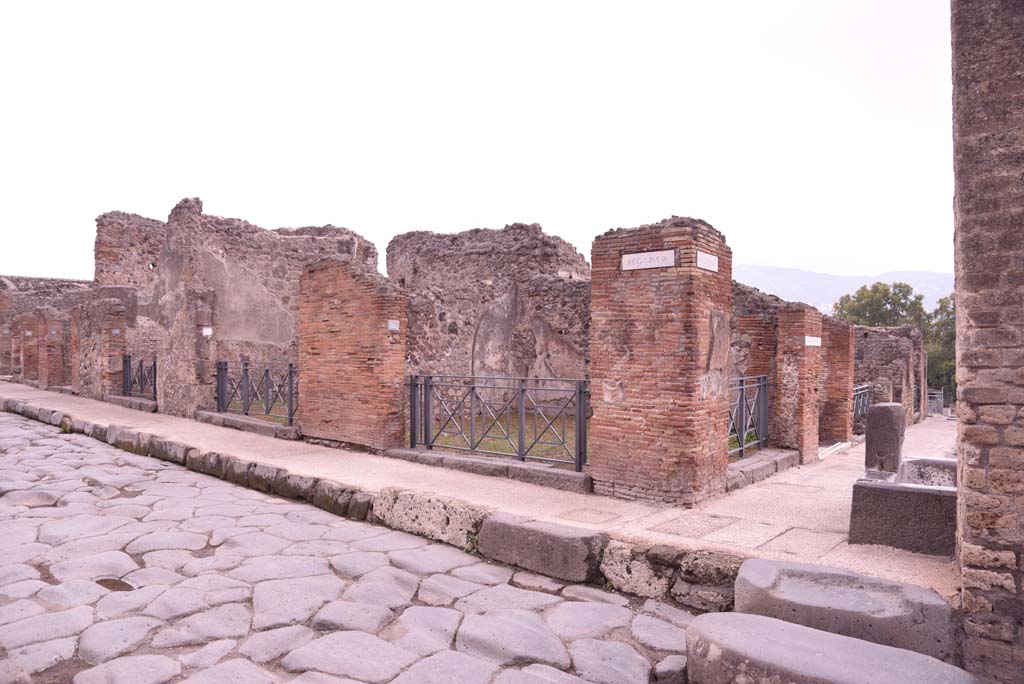 I.4.16 Pompeii, centre right. October 2019. 
Looking south-east at junction of Via dellAbbondanza, on left, and Via Stabiana, on right.
Foto Tobias Busen, ERC Grant 681269 DCOR.
