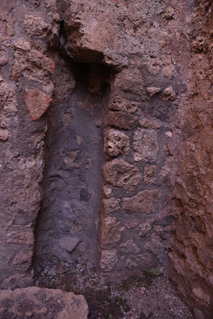 I.4.18 Pompeii. October 2019. 
North-east corner of rear room, detail of site of downpipe from an upper floor room ?
Foto Tobias Busen, ERC Grant 681269 DCOR.
