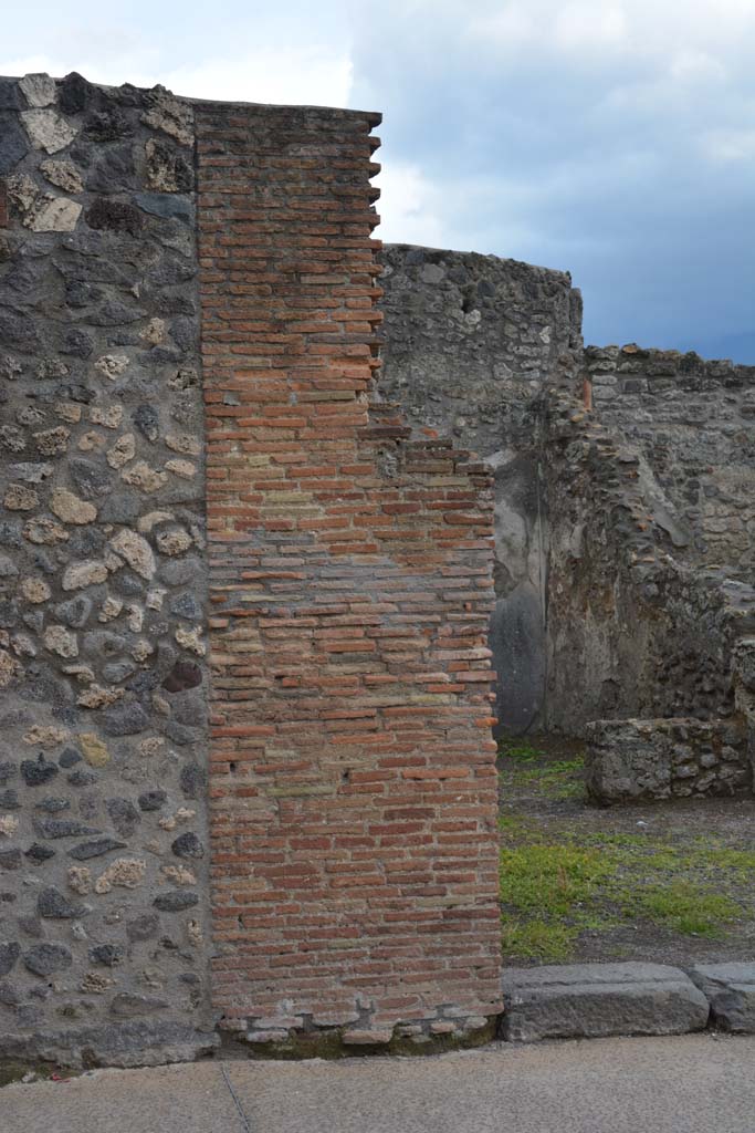 I.4.24 Pompeii, May 2019. 
Looking south to detail of masonry pilaster at east end of entrance doorway.
Foto Tobias Busen, ERC Grant 681269 DCOR.
