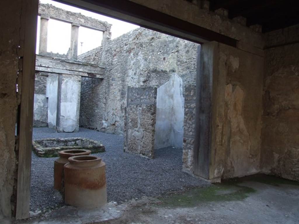 I.6.9 Pompeii. December 2007.  Looking across atrium to bedroom on the west side.
