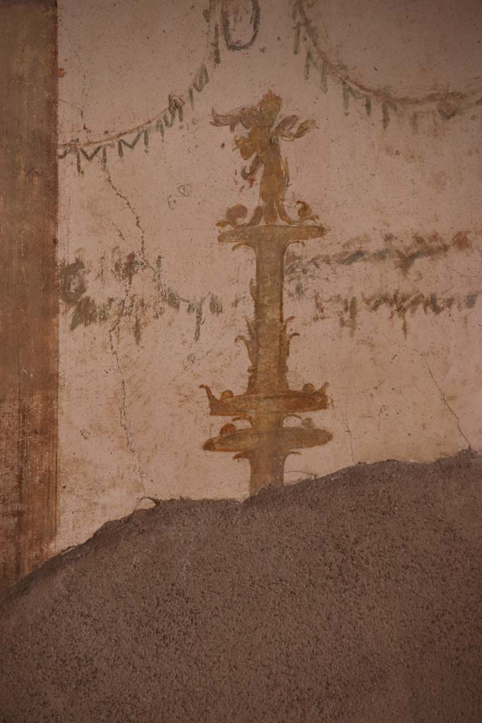 I.7.11 Pompeii. September 2021. 
Detail of painted candelabra from centre of west wall of triclinium. Photo courtesy of Klaus Heese.
