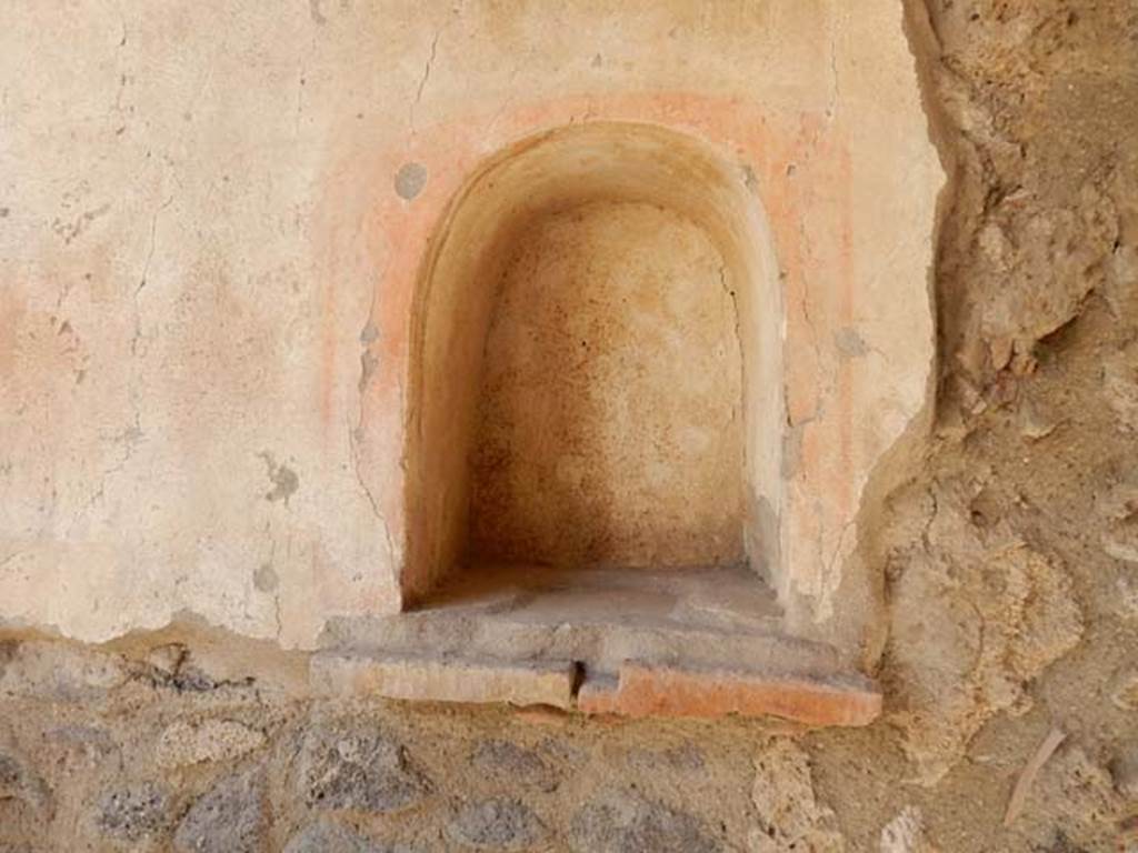 I.7.19 Pompeii. May 2017. Niche in west wall of north portico of garden area. Photo courtesy of Buzz Ferebee.
