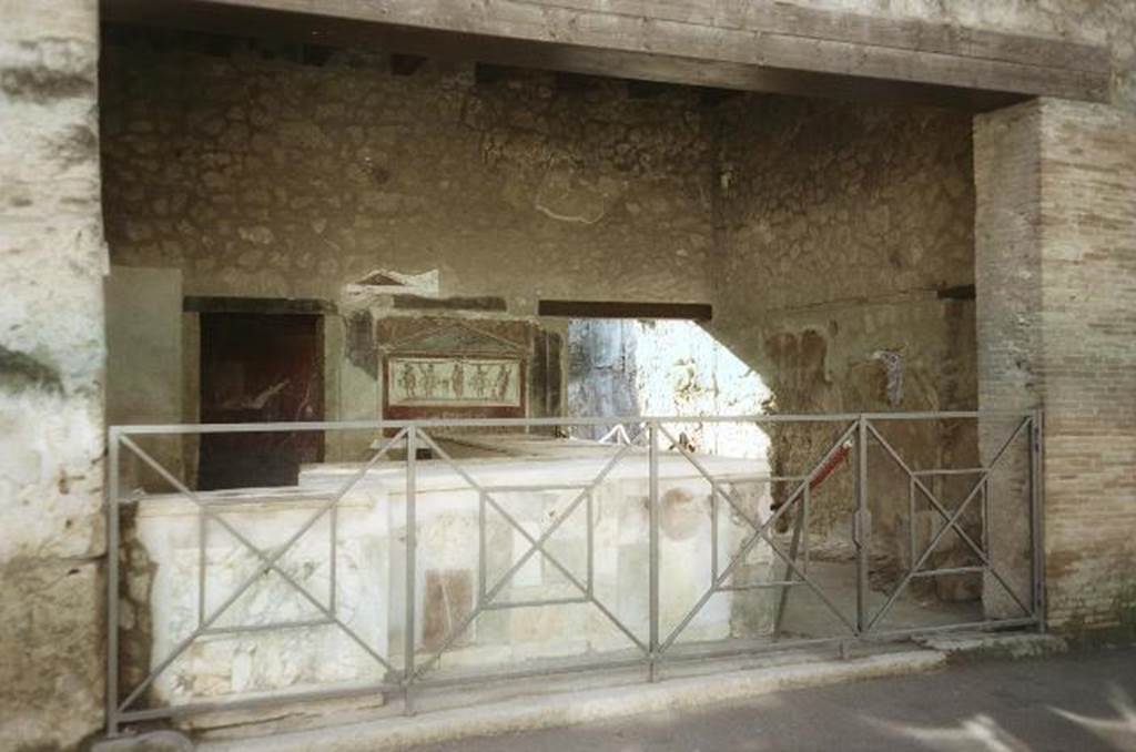 I.8.8 Pompeii. February 2010. Entrance. Photo courtesy of Rick Bauer. According to Varone and Stefani, on the east pilaster of the caupona were the painted graffiti CIL IV 7279-7283 and 7287. See Varone, A. and Stefani, G., 2009. Titulorum Pictorum Pompeianorum, Rome: L’erma di Bretschneider. p. 93-4. According to Epigraphik-Datenbank Clauss/Slaby (See www.manfredclauss.de) these are recorded as

C(aium) Iulium Polybium
aed(ilem) o(ro) v(os) f(aciatis) Placidus cliens rog(at)     [CIL IV, 7279]

Vettium Fir[mum]
aed(ilem) o(ro) v(os) f(aciatis) Betuti fac(iat)     [CIL IV, 7280]

Severum
IIvir(um)
o(ro) v(os) f(aciatis)     [CIL IV, 7281]

Secundum L(uci) f(ilium) aed(ilem)     [CIL IV, 7282]

Ve[soni]um quinq(uennalem)     [CIL IV, 7283]

Gavium et Trebium aed(iles) o(ro) v(os) f(aciatis)     [CIL IV, 7287]
