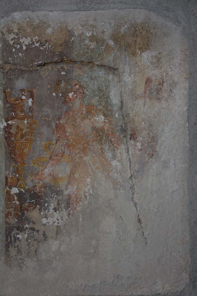 I.8.17 Pompeii. March 2019. 
Room 9, detail of figure from west side of central wall painting on north wall.
Foto Annette Haug, ERC Grant 681269 DCOR.
