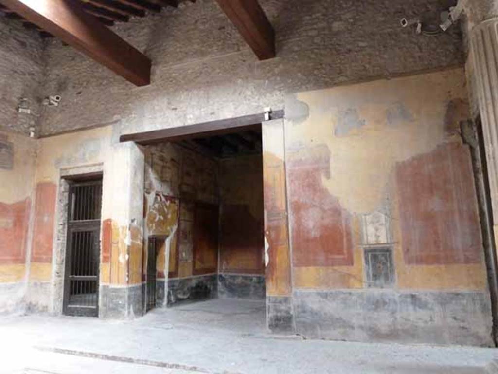 I.10.4 Pompeii. May 2010. Atrium, east wall with doorways to rooms 3 and 4.