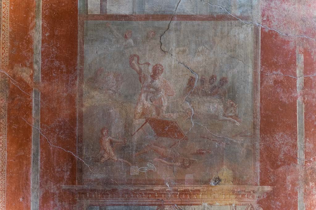 I.10.4 Pompeii. April 2022. Room 4, south wall with central wall painting of the Death of Laocoon. Photo courtesy of Johannes Eber.