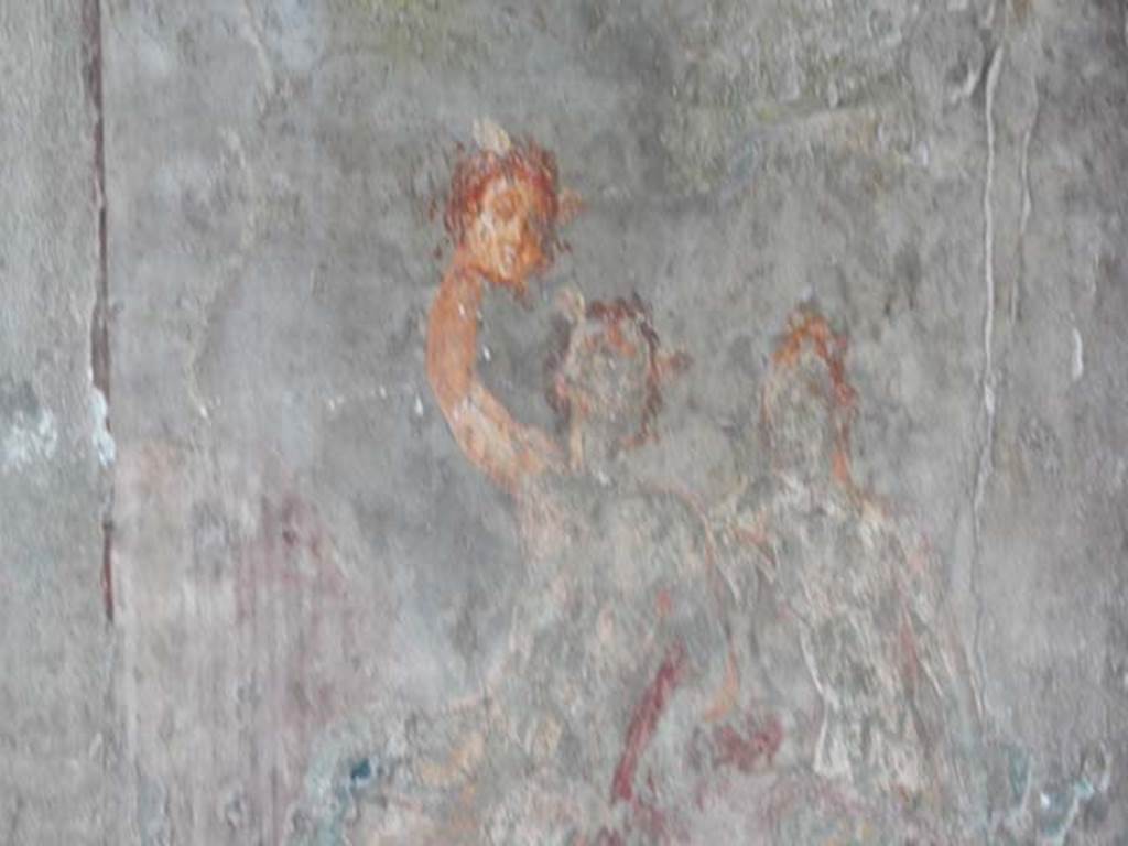 I.10.4 Pompeii. May 2015. Room 11, detail of painting of Andromeda and Perseus, with the head of the Gorgon held high. Photo courtesy of Buzz Ferebee.
