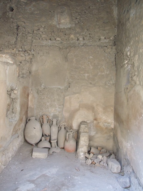 I.10.7 Pompeii.  December 2007.  Room 1.  Latrine and remains of stairs to upper floor on right.
