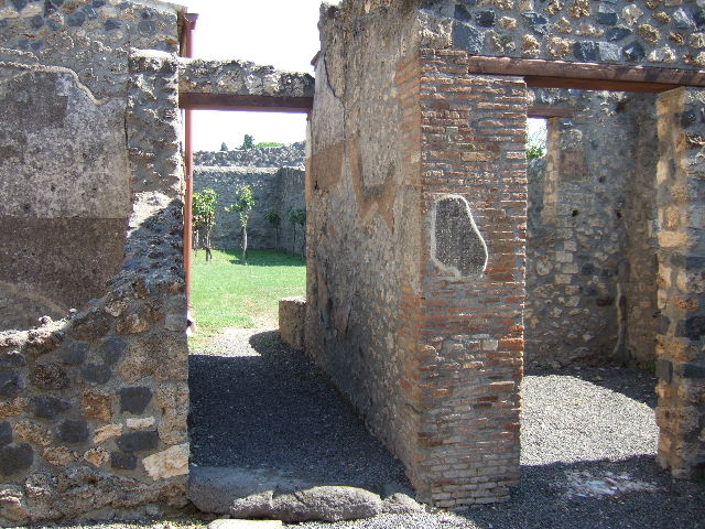 I.11.12 Pompeii.  September 2005.  Painted wall decoration with window.