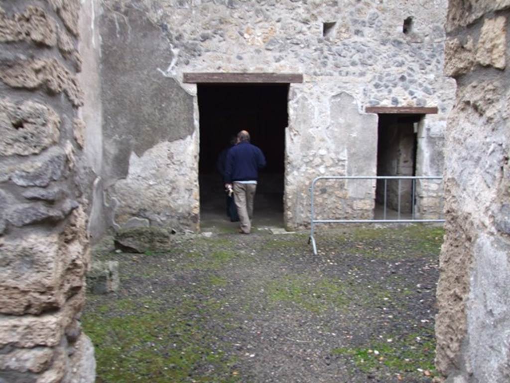 I.11.17 Pompeii. December 2007. Room 1, atrium, looking east towards triclinium, and doorway to rear rooms.