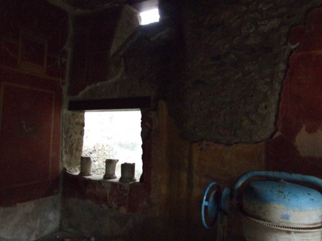 I.11.17 Pompeii. December 2007. Room 3, south wall of triclinium with window onto corridor.