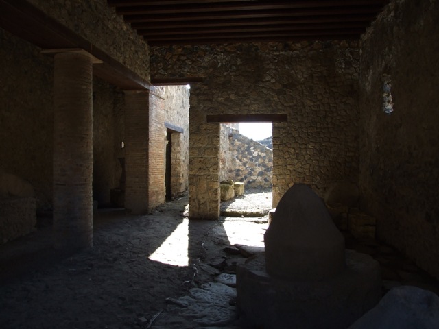 I.12.2 and I.12.1 Pompeii.  March 2009  Room 3. Room with mills.  Looking south.