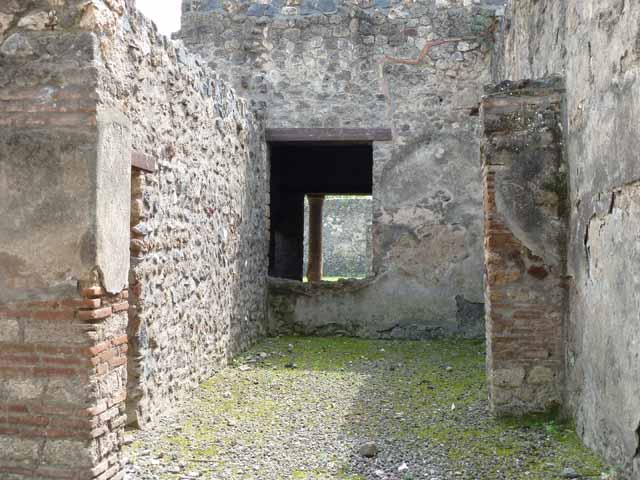 I.12.2 and I.12.1 Pompeii.  March 2009.  Room 4.  East wall. Looking north east.