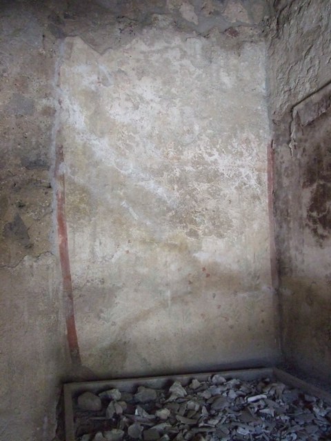 I.12.8 Pompeii.  March 2009.   West side of south portico, with doorway to room 10.