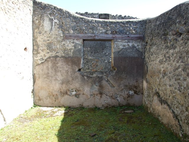 I.13.15 Pompeii. March 2009.  Room on north east side of central courtyard.  East wall with window.