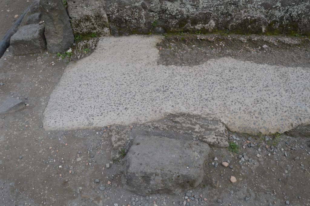 I.15.1 Pompeii. March 2019. Pavement at east corner of Insula on Via di Castricio.
Foto Taylor Lauritsen, ERC Grant 681269 DÉCOR.
