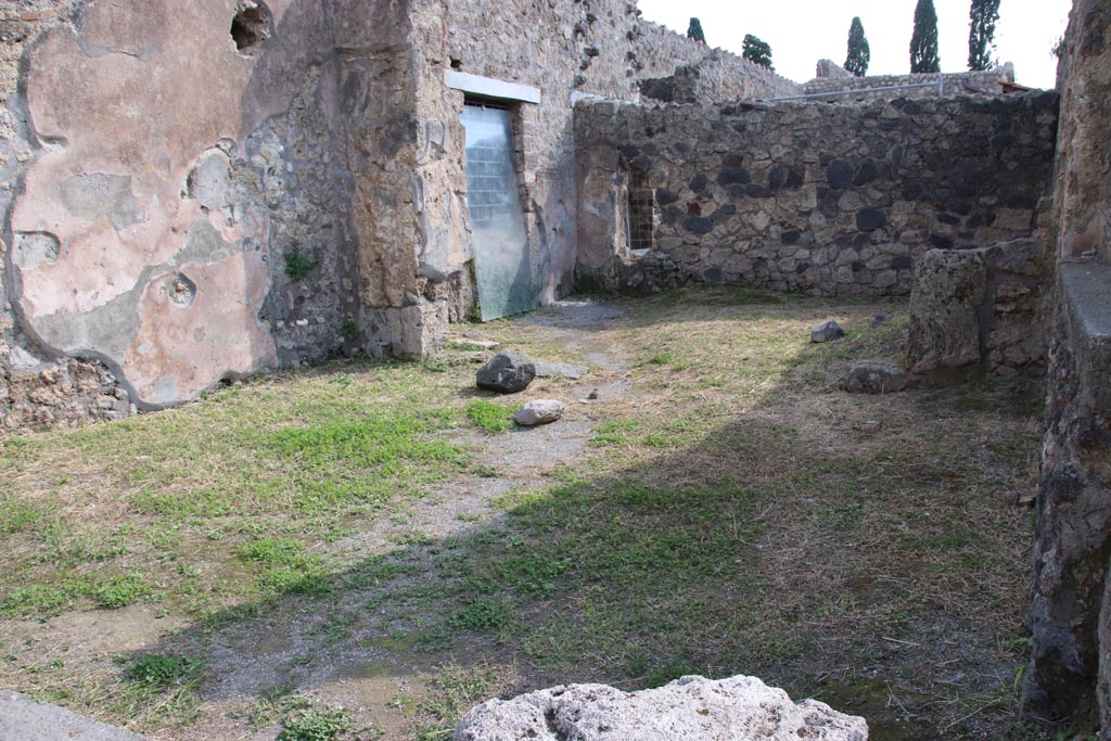 II.4.1 Pompeii. October 2022. Looking south across shop-room towards rear room. Photo courtesy of Klaus Heese