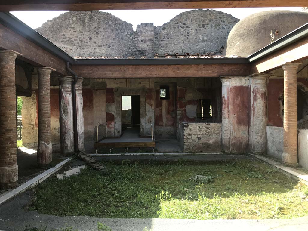 II.4.6 Pompeii. April 2019. Looking south from entrance doorway towards south portico.
Photo courtesy of Rick Bauer.
