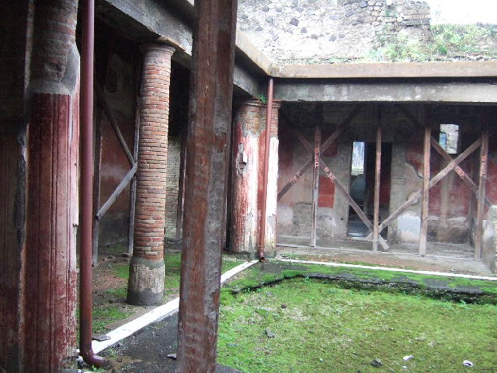 II.4.6 Pompeii. December 2006.  View looking south from entrance across the Baths Portico