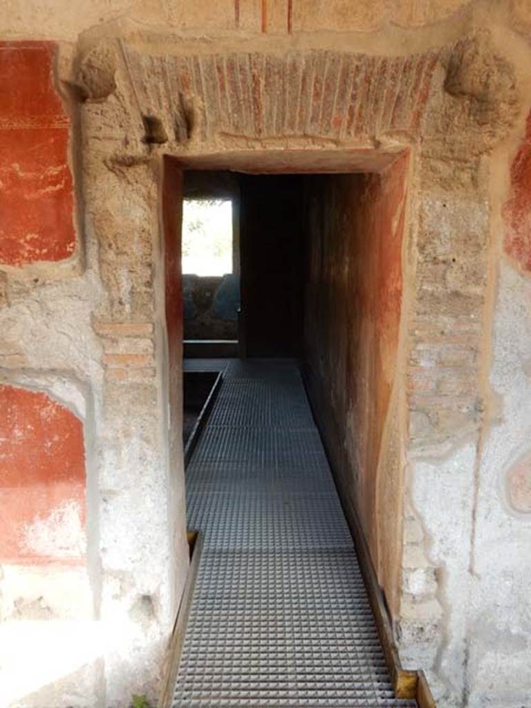 II.4.6 Pompeii. September 2019. Looking south through doorway into apodyterium.  
Photo courtesy of Klaus Heese.
