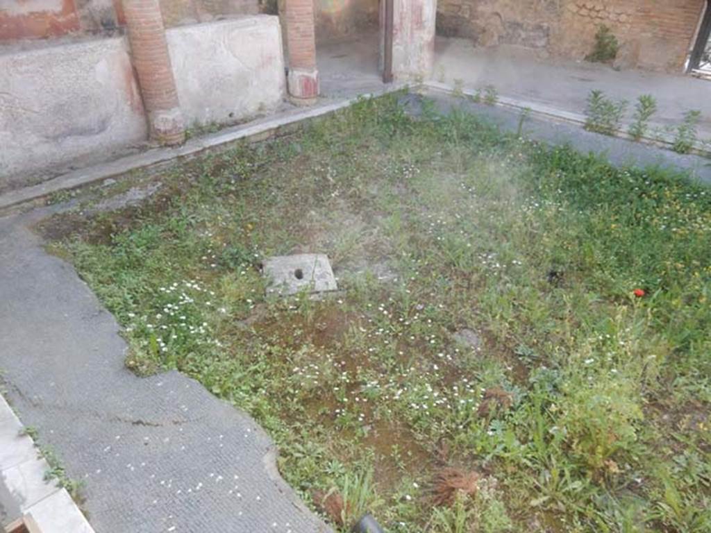 II.4.6 Pompeii. May 2017. Looking across flooring towards north-west corner.
Photo courtesy of Buzz Ferebee.
According to PPM, there was a low basin in the centre of the courtyard, functioning as an impluvium. In the bottom, there was a large black and white mosaic with a marine scene with dolphins and tritones.
This was found between 30th November and 7th December 1755. It was removed and taken away during the Bourbon period. 
See Carratelli, G. P., 1990-2003. Pompei: Pitture e Mosaici: Vol. III.  Roma: Istituto della enciclopedia italiana, p. 208. 
