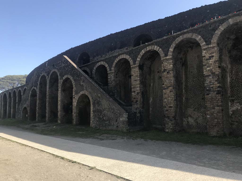 II.6 Pompeii. April 2019. Amphitheatre, central west side double staircase and new cement walkway.
Photo courtesy of Rick Bauer.
