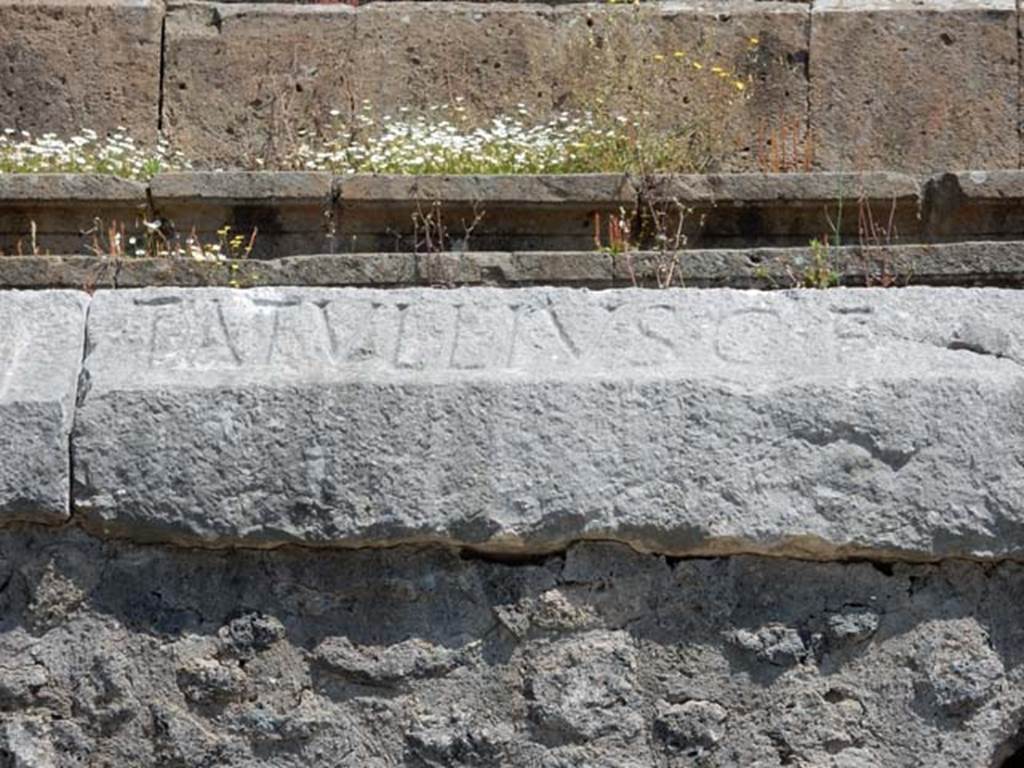 II.6 Pompeii. May 2016. Inscription carved on rim of inner wall of the arena of the Amphitheatre.
Part inscription T. ATVLLIVS C. F.  Photo courtesy of Buzz Ferebee.
According to CIL X this is the start of the inscription
T. ATVLLIVS C. F. CELER II V. PRO LVD LV CVN F. C. EX. D. D.   [CIL X 854]
