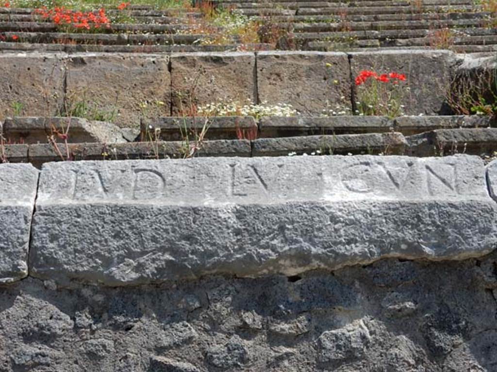 II.6 Pompeii. May 2016. Inscription carved on rim of inner wall of the arena of the Amphitheatre.
Inscription LVD LV CVN, part of CIL X 854. Photo courtesy of Buzz Ferebee.
