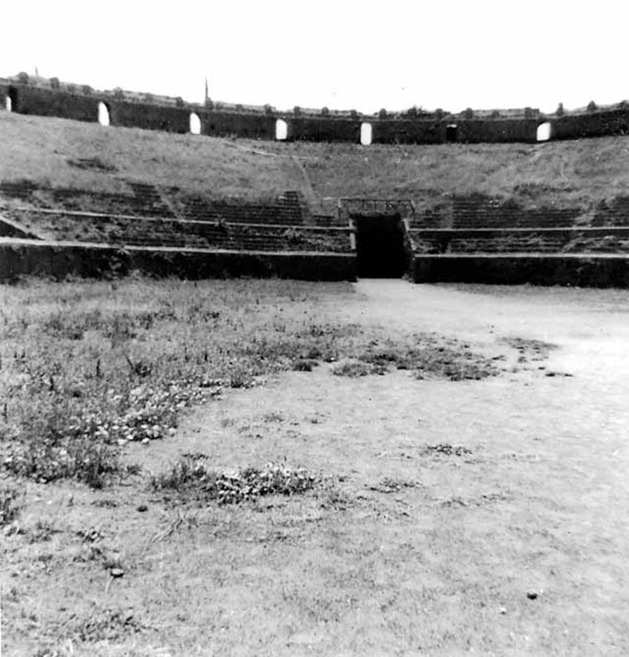 II.6 Pompeii. 1944. Arena and seating of Amphitheatre, looking south. Photo courtesy of Rick Bauer.