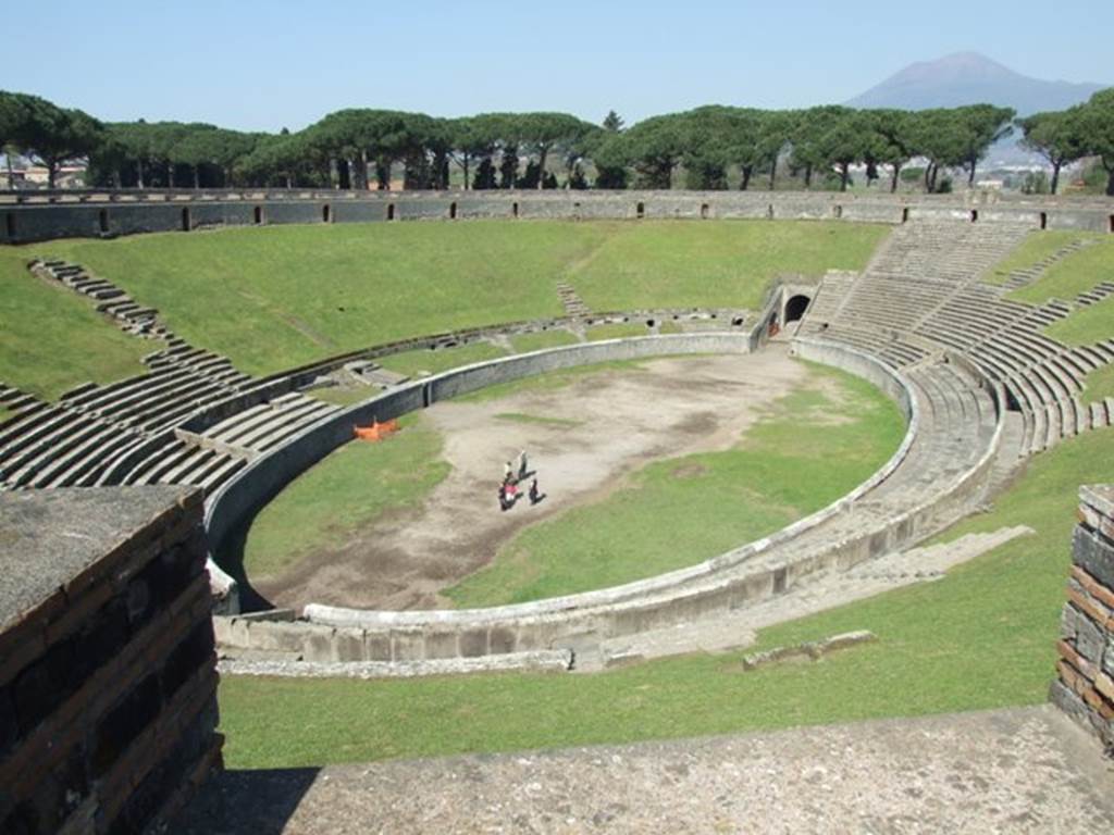 II.6 Pompeii. March 2009. Looking north-west across arena from upper level of the Amphitheatre.