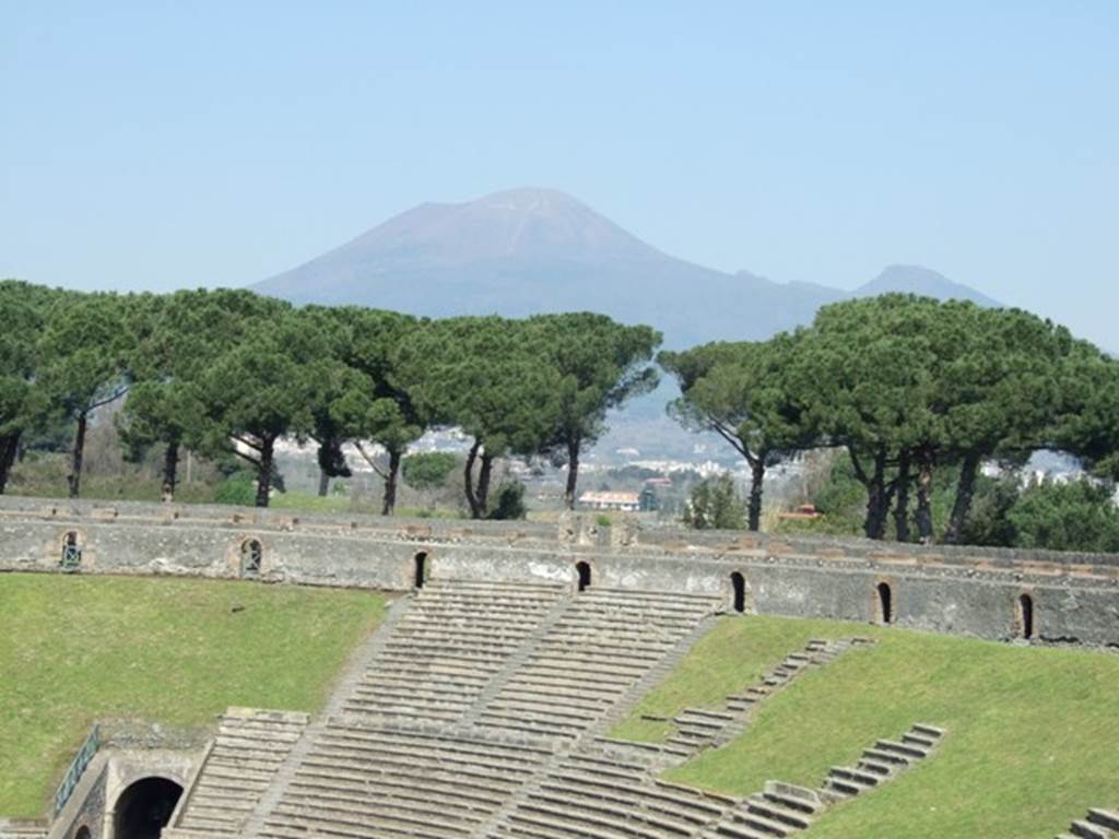 .6 Pompeii. March 2009. Looking north to Vesuvius and north side of upper level of the Amphitheatre.