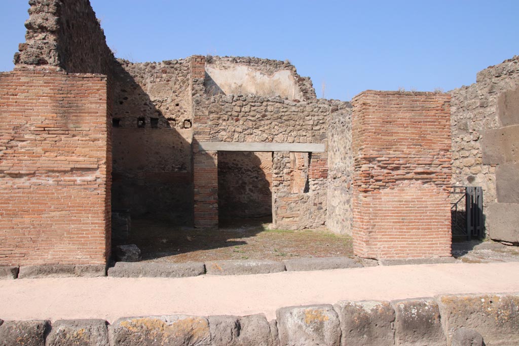 V.1.2 Pompeii. October 2023. Entrance doorway on north side of Via di Nola. Photo courtesy of Klaus Heese.