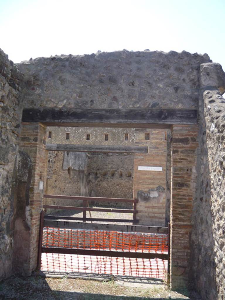 V.1.16 Pompeii. July 2008. Threshold of entrance doorway from interior, looking west.
Photo courtesy of Jared Benton.


