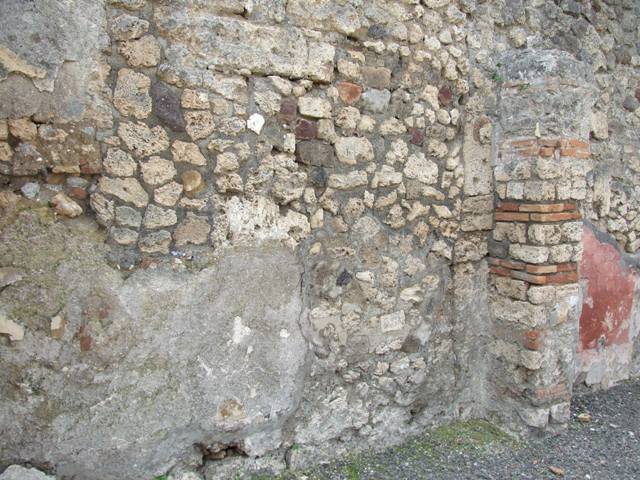 V.2.14 Pompeii.  March 2009.  East wall of shop with base for stairs to upper floor in north east corner.