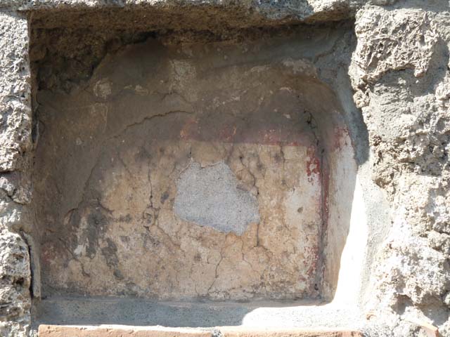 V.2.14 Pompeii.  March 2009.  East wall of rear room.