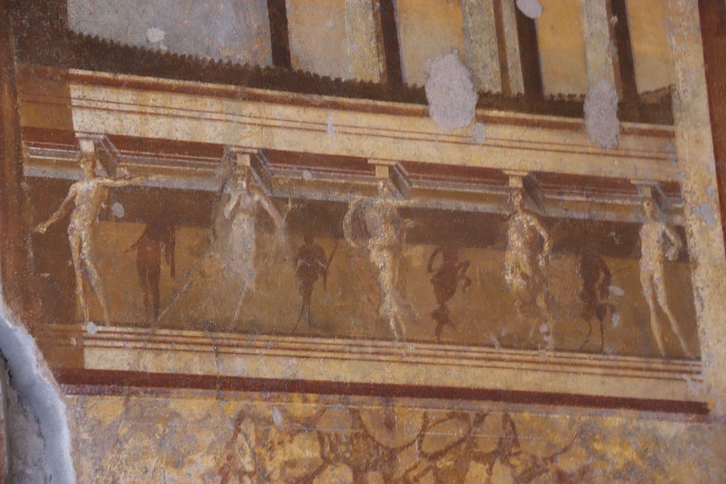 V.2.i Pompeii. October 2023. Room 19, detail from upper east wall. Photo courtesy of Klaus Heese.