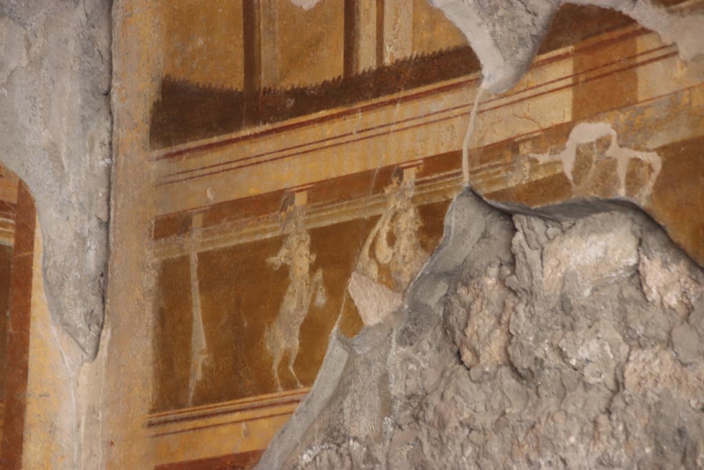 V.2.i Pompeii.  October 2023. Room 19, detail from upper west wall at south end. Photo courtesy of Klaus Heese.