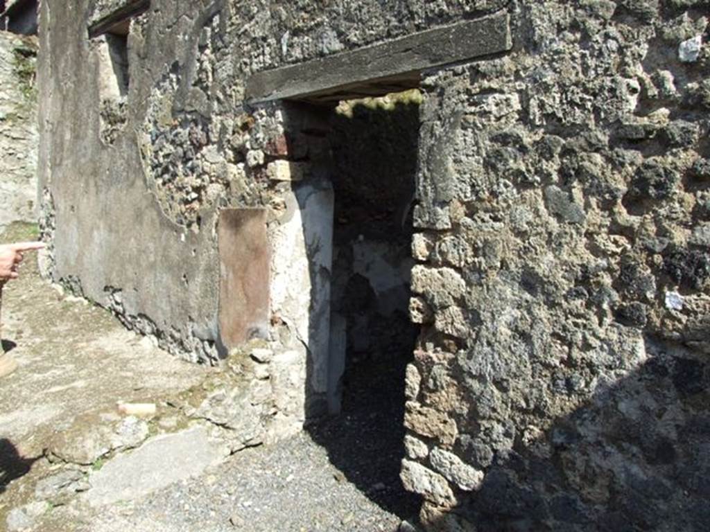 V.4.3 Pompeii.  March 2009.   Doorway to Kitchen in east wall of South Portico area.