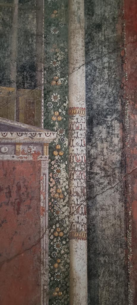 V.4.a Pompeii. January 2023.
Room ‘h’, detail of painted column on upper north wall above separating panel on west side of central painting.
Photo courtesy of Miriam Colomer.
