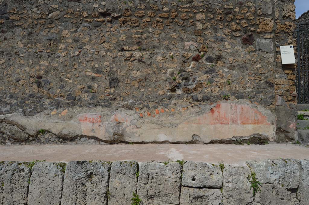 V.5.3 Pompeii. March 2018. High pavement and remains of painted plaster on wall to left (west) of entrance doorway.
Foto Taylor Lauritsen, ERC Grant 681269 DÉCOR.

