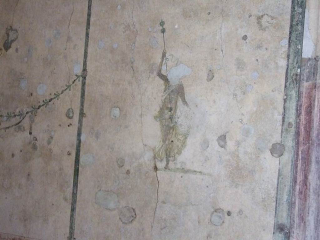 V.5.3 Pompeii. March 2009. Room 6, wall painting of figure on north end of east wall of triclinium.