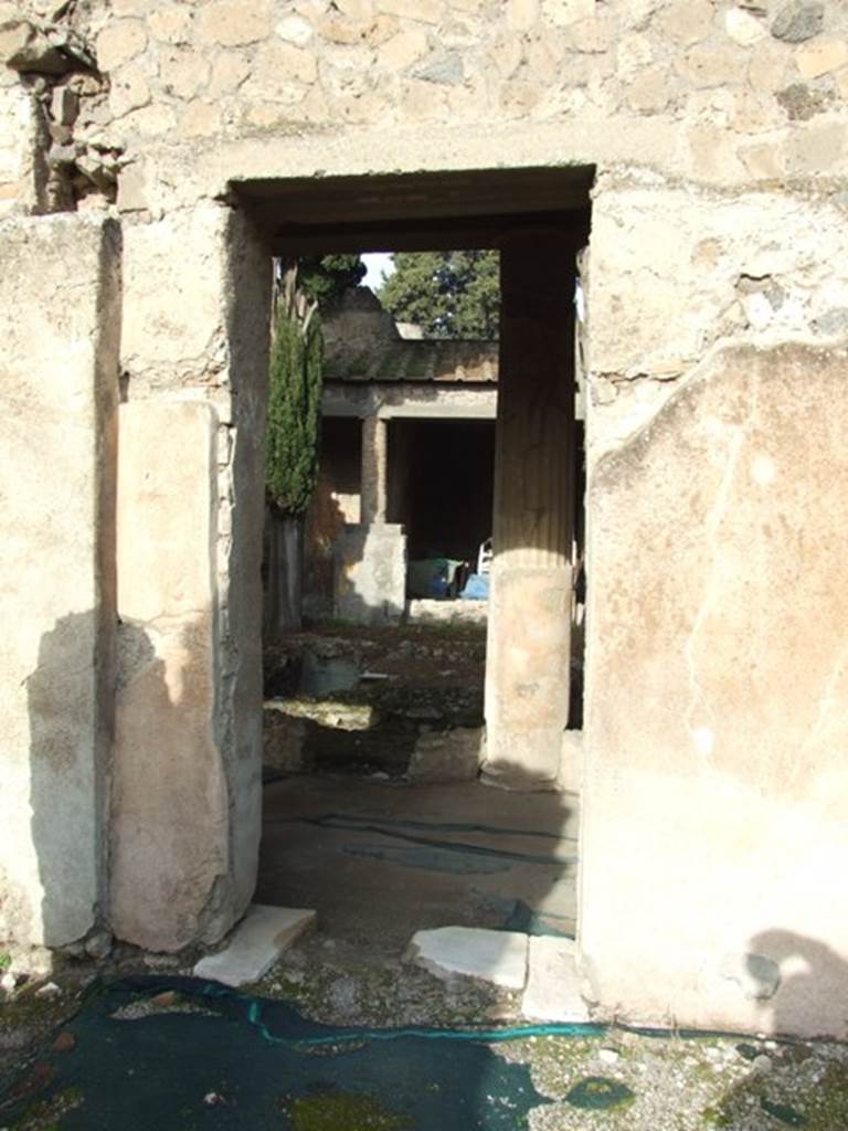VI.1.7 Pompeii. December 2007. Doorway to room 13, the peristyle from room 11.
