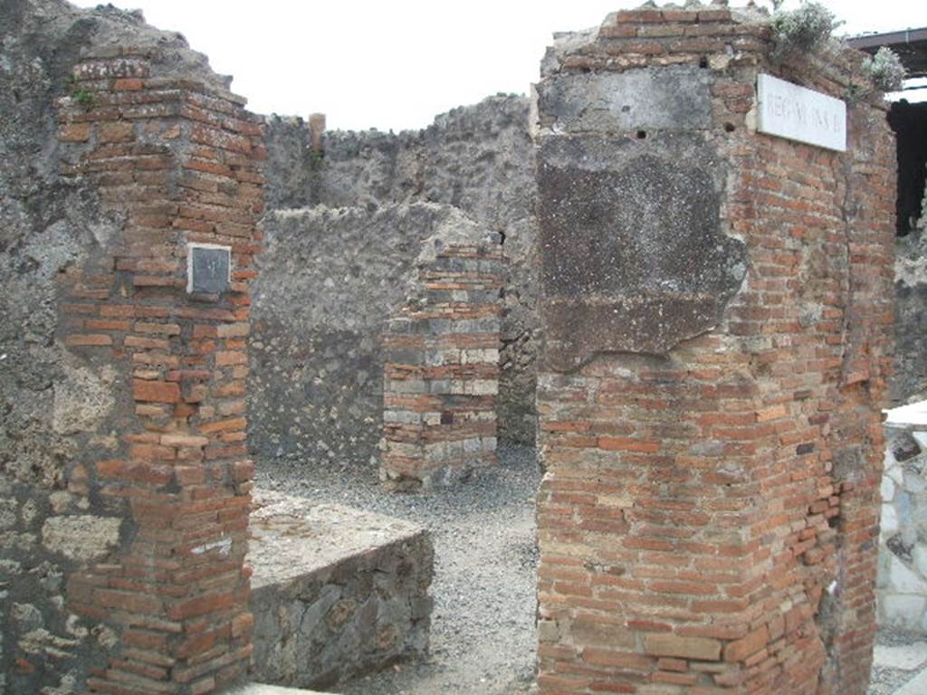 VI.4.2 Pompeii. May 2005. Looking west towards entrance doorway of steps to upper floor.

