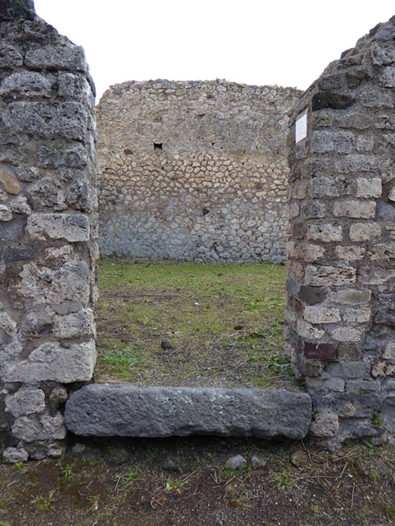 VI.6.11? or 12? Pompeii. January 2017. Entrance doorway, looking south from Vicolo di Mercurio.
Foto Annette Haug, ERC Grant 681269 DCOR.
We, using the Eschebach plan, had this numbered as VI.6.11, although in the 2007 and 2005 photos below the doorway is seen as unnumbered. 
Now it clearly appears to have been renumbered to VI.6.12.
(Perhaps the doorway at VI.6.10a has now been renumbered to VI.6.11.)
